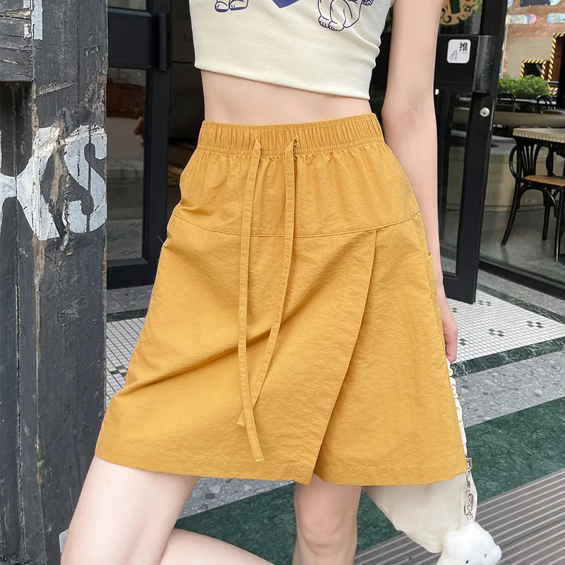 Damska szybkoschnąca spódnico-spodenki sportowe na lato, codzienna elastyczna talia, rozcięcie z przodu, spódnico-spodenki cargo.