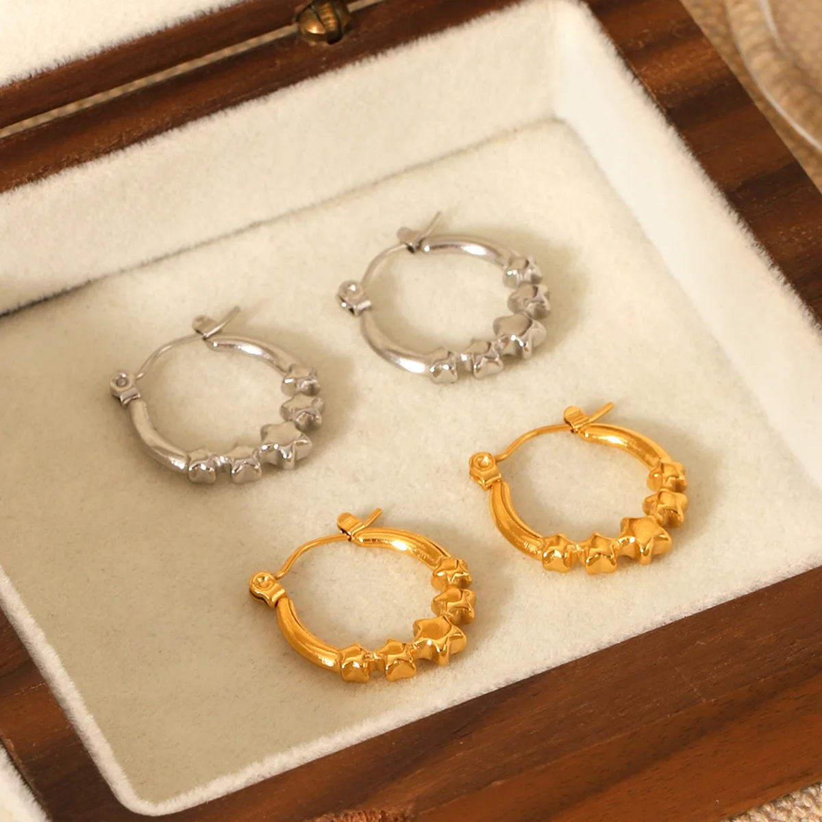 Stainless steel five-pointed star earrings, light luxury high-end star hoop earrings, non-fading titanium steel ear jewelry