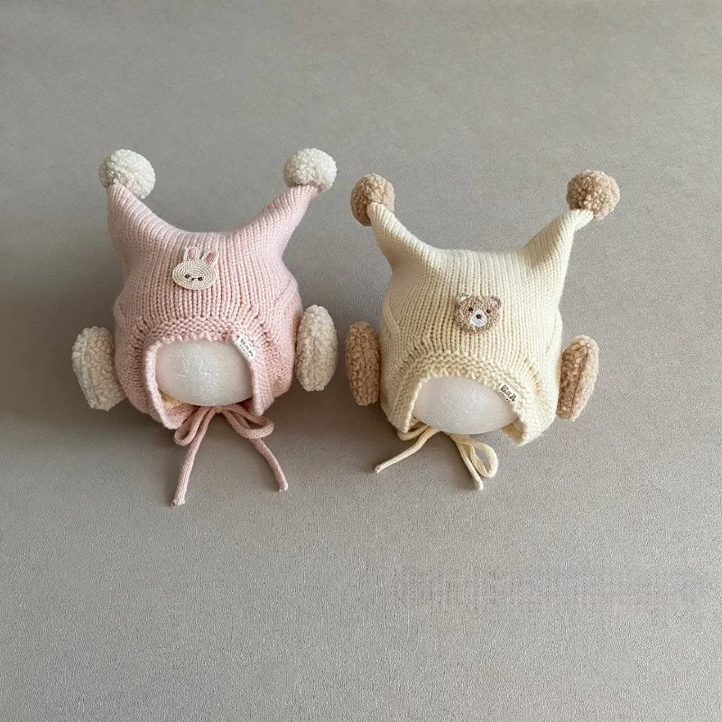 

Cute cartoon infant hat, autumn and winter style, warm knitted wool with ear flaps, windproof, suitable for baby boys and girls.