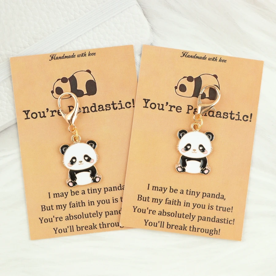 1 ou 2 porte-clés mignons en forme de petit panda, accompagnés d'une carte de motivation avec l'inscription « Vous êtes le meilleur ! », pour les passionnés de pandas.