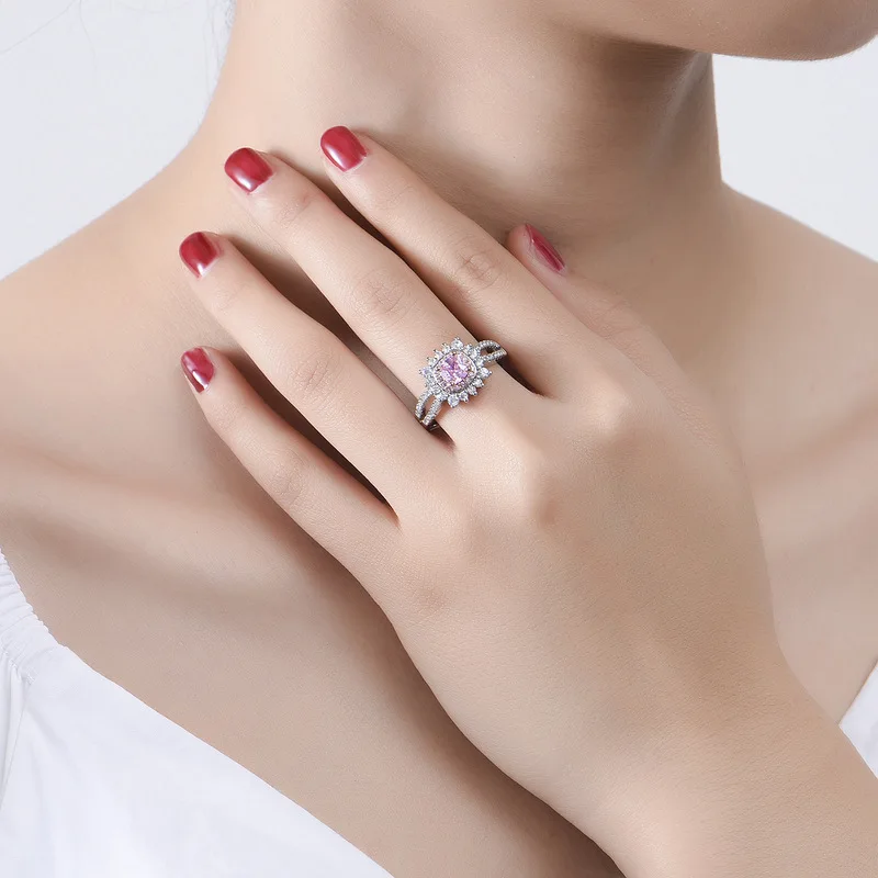New luxury full-diamond split rose gold imitation pink color gemstone women's engagement ring. Elegant jewelry.