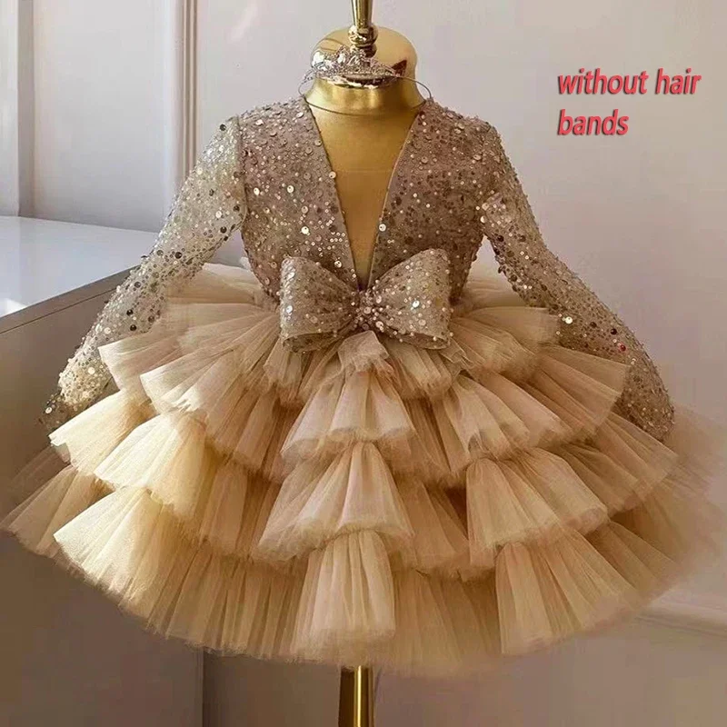 

Girls Long Sleeve Sequin Embellished Tiered Tulle Gown With Bow Accent Ideal For Flower Girl Duties Birthday Celebrations Piano