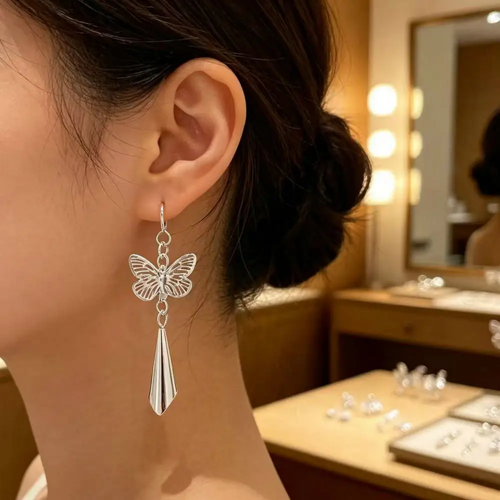 Ethnic Style Hollow Water Droplet Retro Long Carved Earrings High-End Slimming Versatile Ear Accessory