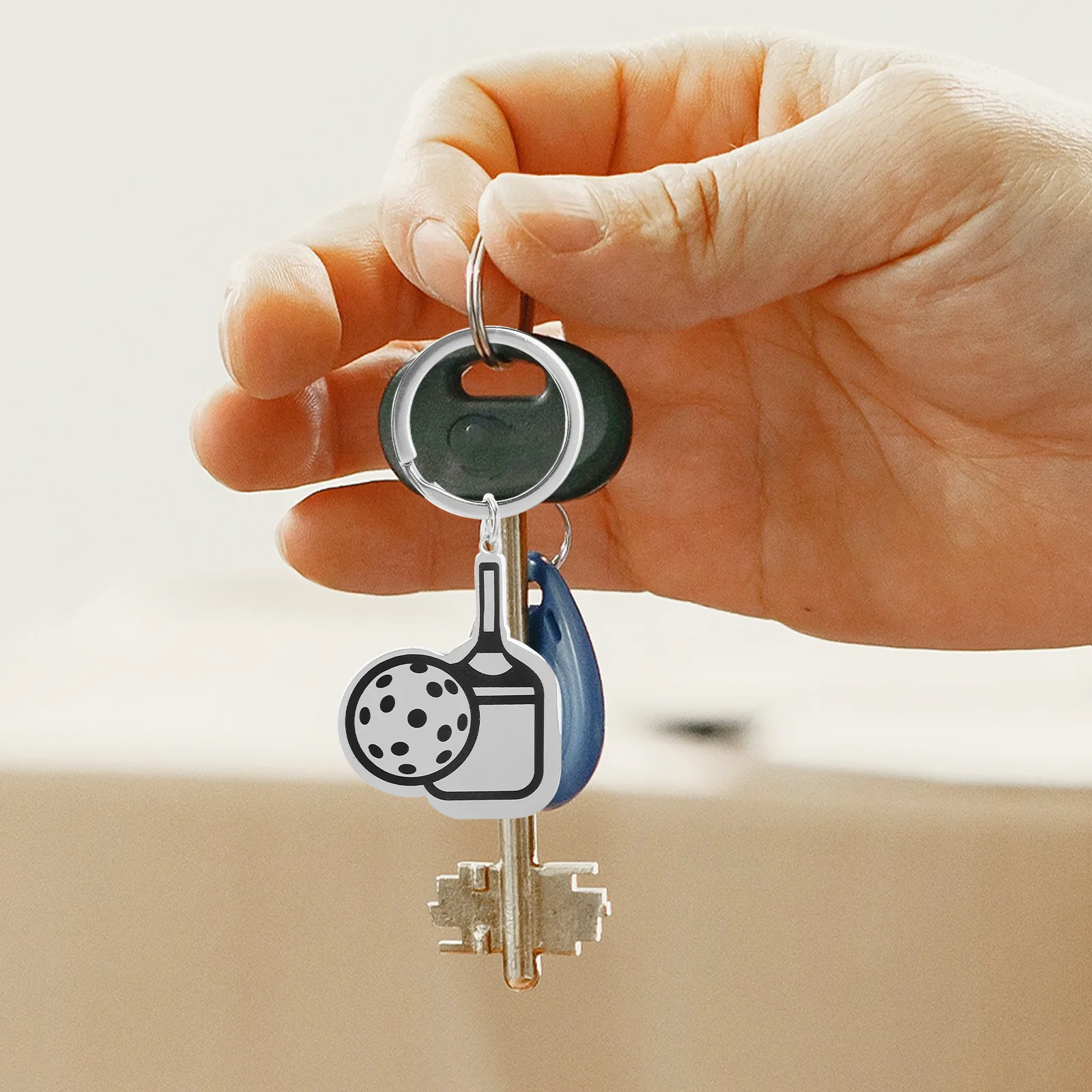 

Stainless Steel Pickleball Paddle Keychain Mini Sports Ball Charm Durable Compact Design For Backpacks Sports Bags Pickleball