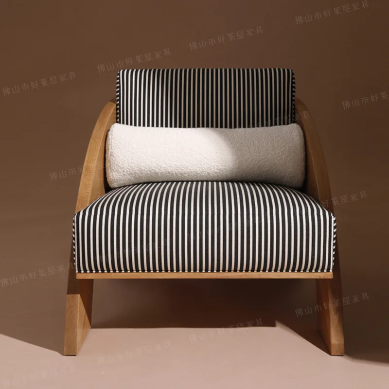 Solid wood sofa chair designer single sofa medieval solid wood chair soft bag is simple