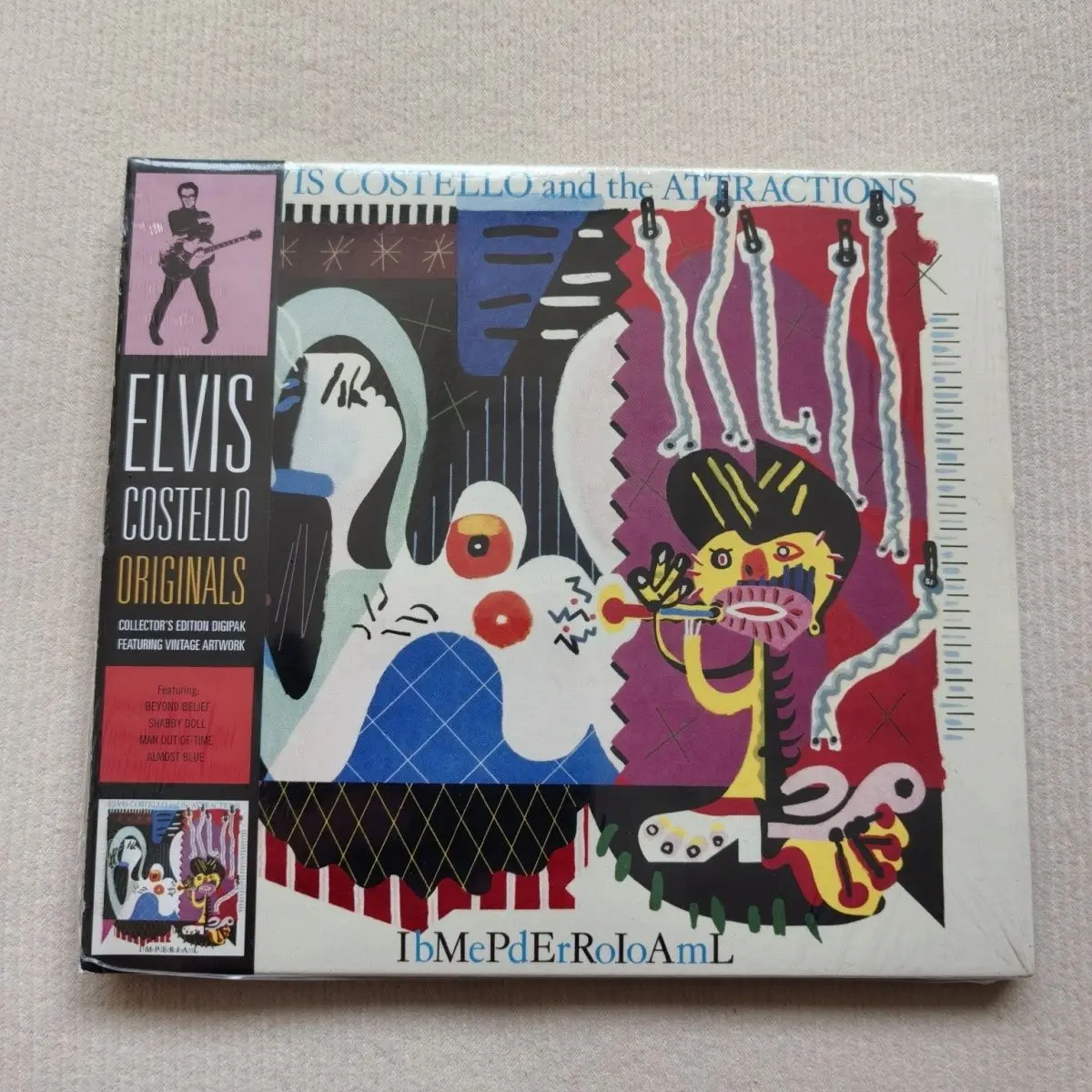 

Rock Elvis Costello The Attractions Music CD Imperial Bedroom Album Beyond Belief Music Record Cosplay Walkman Soundtracks Box