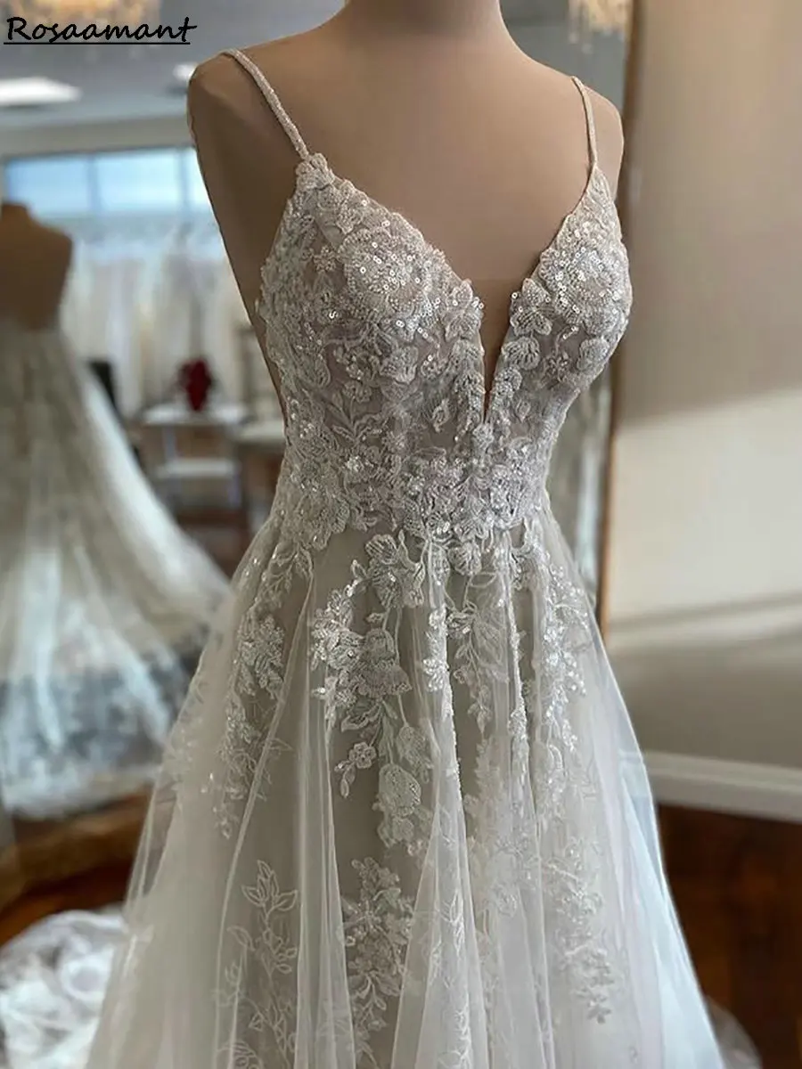 بريق مطرزة يزين الدانتيل بلا أكمام ألف خط فساتين الزفاف السباغيتي الأشرطة عارية الذراعين أثواب الزفاف البلد