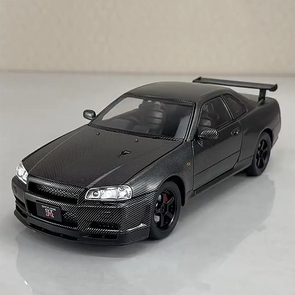 1:24 GTR R34 Modello in miniatura Pressofuso in lega Auto giocattolo 4 porte aperte Suono Luce Tirare indietro Ruota anteriore Sterzo Veicolo per il regalo del ragazzo
