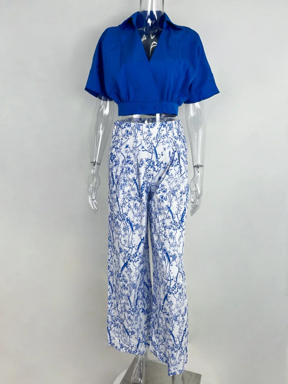 Hoge taille bedrukte broek met wijde pijpen Street Sle Casual broek Lange broek Faionable Eenvoudig ontwerp Zomercollectie