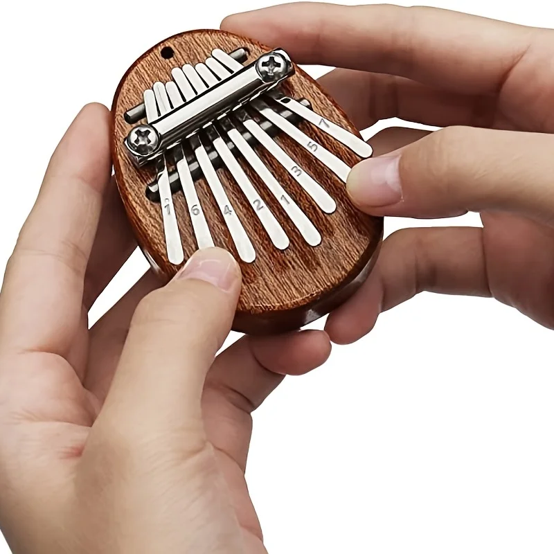 

8 Key Mini Kalimba High Quality Exquisite Finger Thumb Piano Marimba Musical Good Accessory Pendant Gift, Christmas Gift