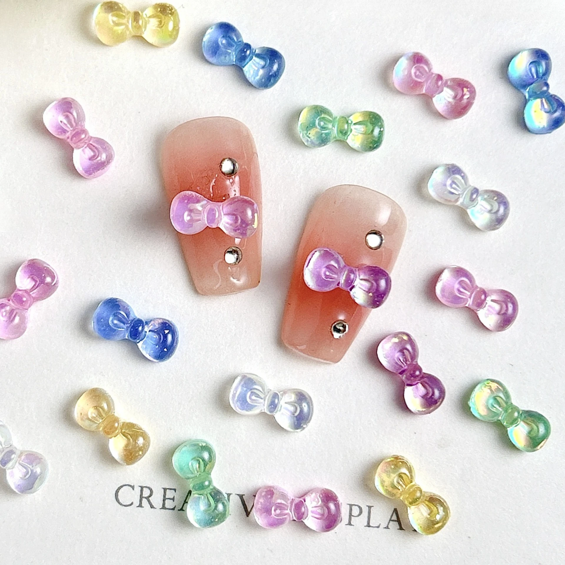 

50 шт., смоляные ледяные прозрачные красочные аксессуары для дизайна ногтей в форме банта, одежда для ногтей своими руками, шпильки для ушей, аксессуары для чехла для телефона, украшения