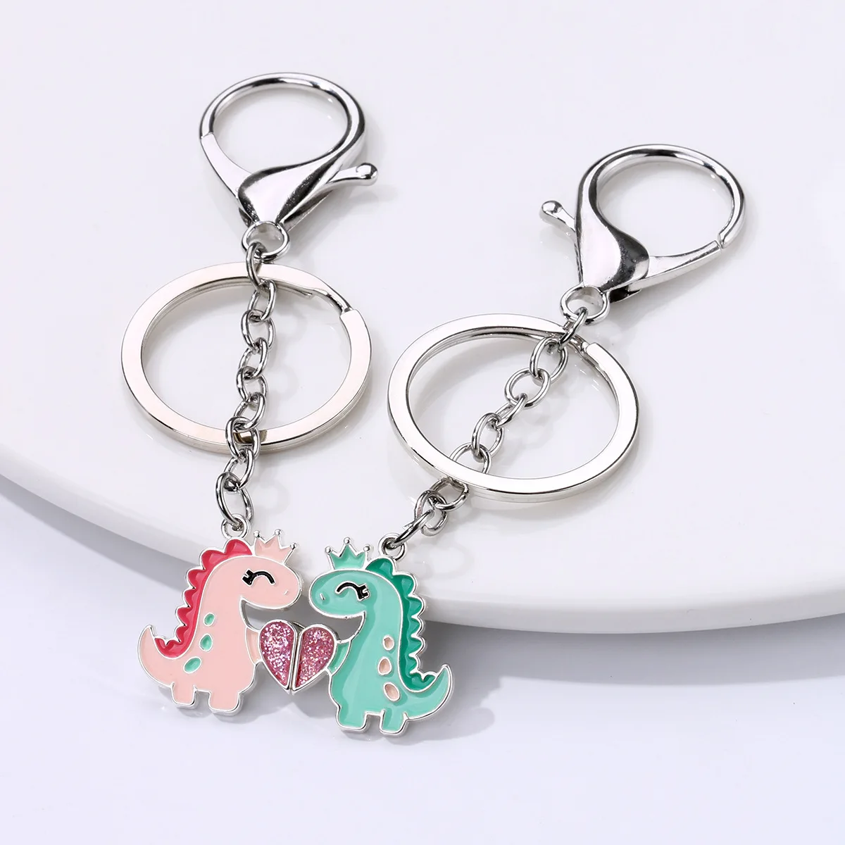 New Small Dinosaur Pendant Cartoon Sweet Magnetic Keychain Alloy Drip Oil Best Friend Set Pendant Gift Wholesale