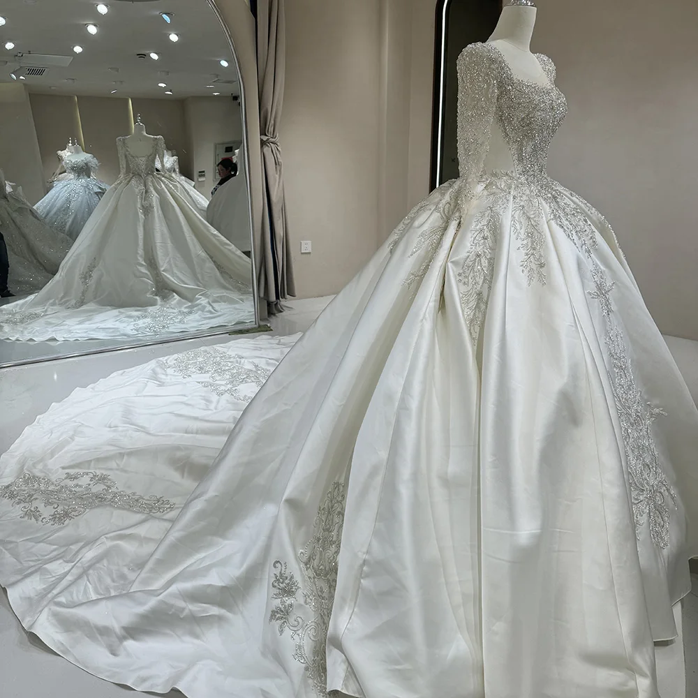 Charmante O-hals Trouwjurken Kant Baljurk Lange Mouwen Knoop Bruidsjurk Hof Trein vestidos de novia boda Aangepast