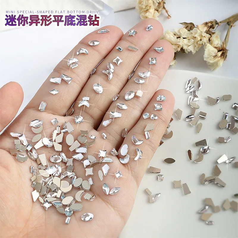 

50pcs Mixed Irregular Mini Flat Bottomed Crystal Diamonds Flowers Butterfly Moon Rhinestone Nail Art Accessories Decoration Gem