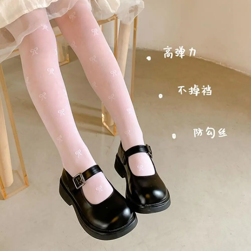 

Children's pantyhose wholesale spring and summer thin white stockings velvet dance socks high elastic girl leggings.