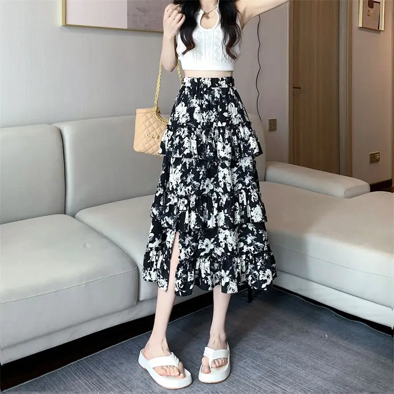 

Fashion Printed Spliced Ruffles Split Floral Skirts Female Clothing 2025 Summer New Loose All-match Elastic High Waist Skirts