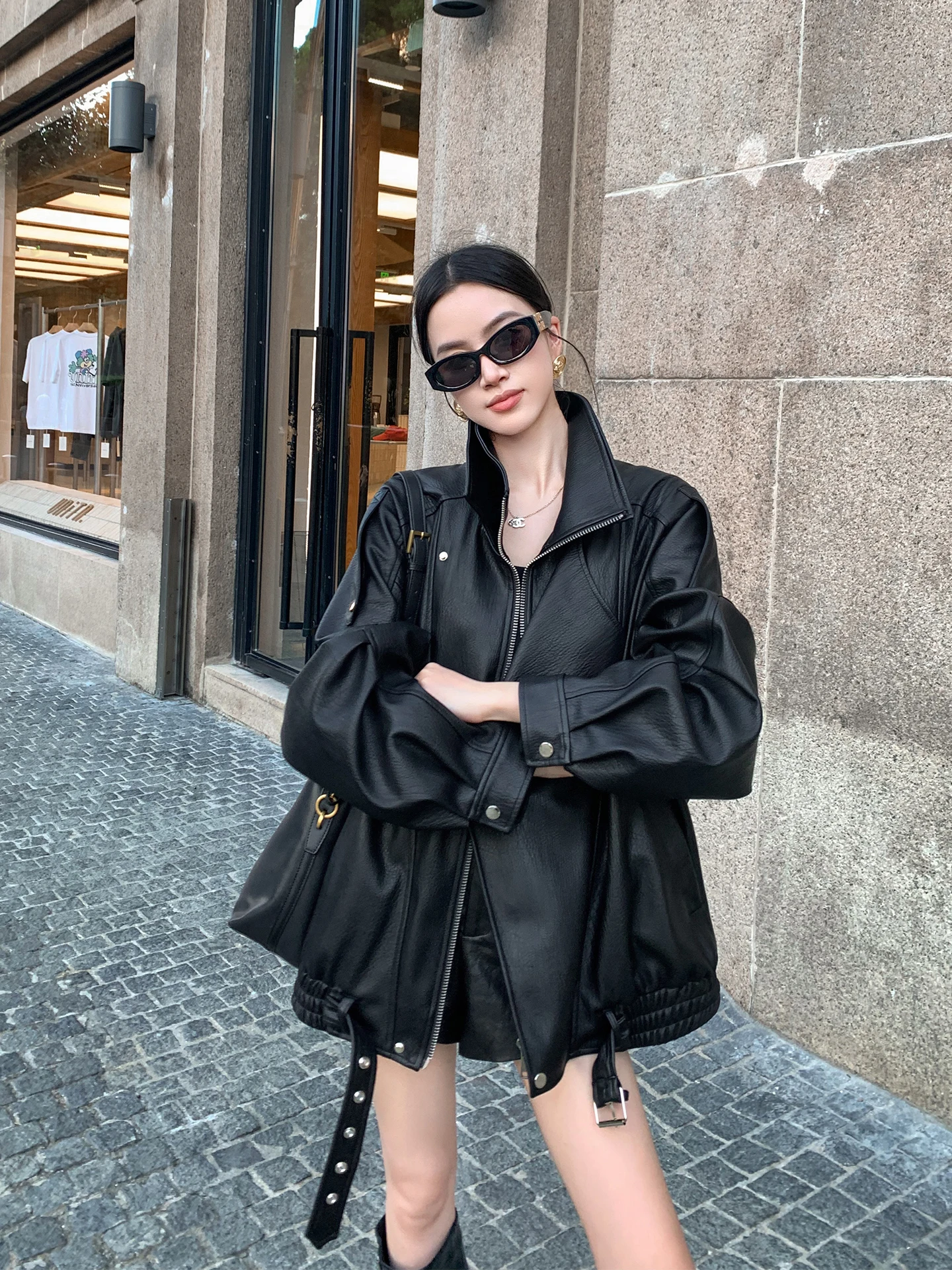 Kurtka motocyklowa Binguo, damska, skórzana, casualowa, wiosenno-jesienna, z małym, designerskim akcentem, luźny krój, długa.