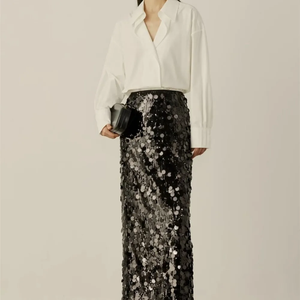 Autumn new elegant style sequin black straight through long skirt for women