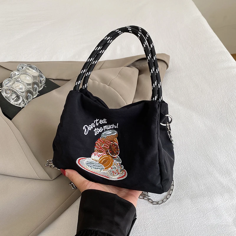 New 2026 Women's Nylon Crossbody Bag Lightweight Mobile Phone Bag Cute Walking Versatile Baby Walking Bag Tote Handbag