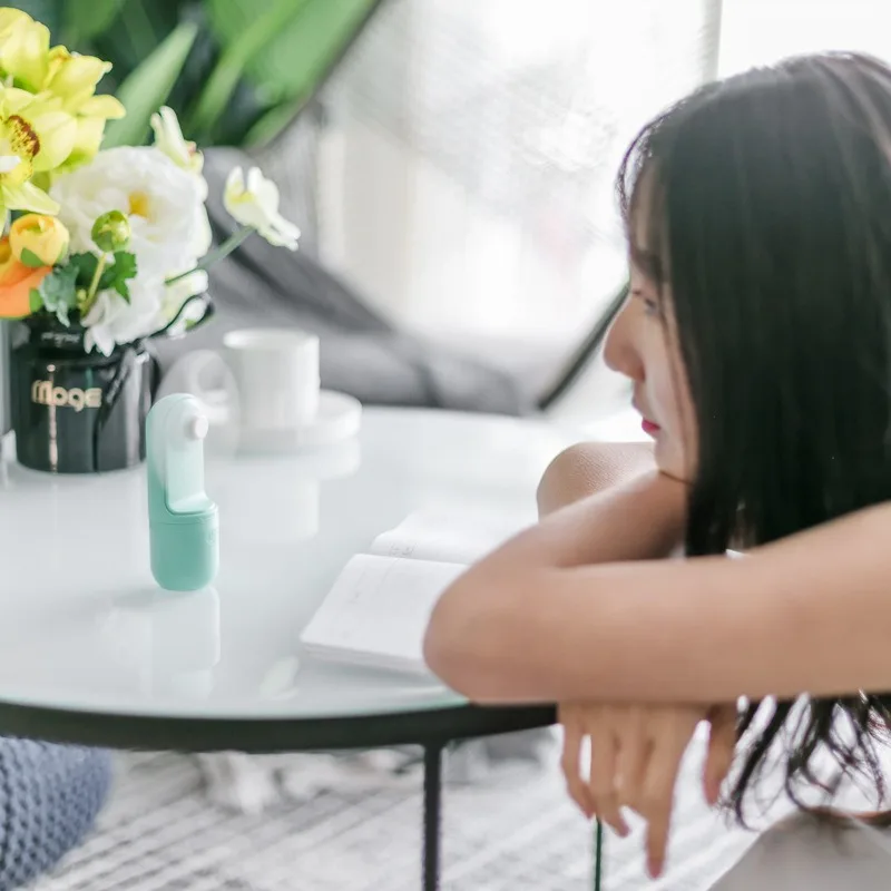 Capsule Mini Fan Ultra-Compact Design Foldable Blades Two Speed Settings Smart One-Touch Stop Large Battery Capacity