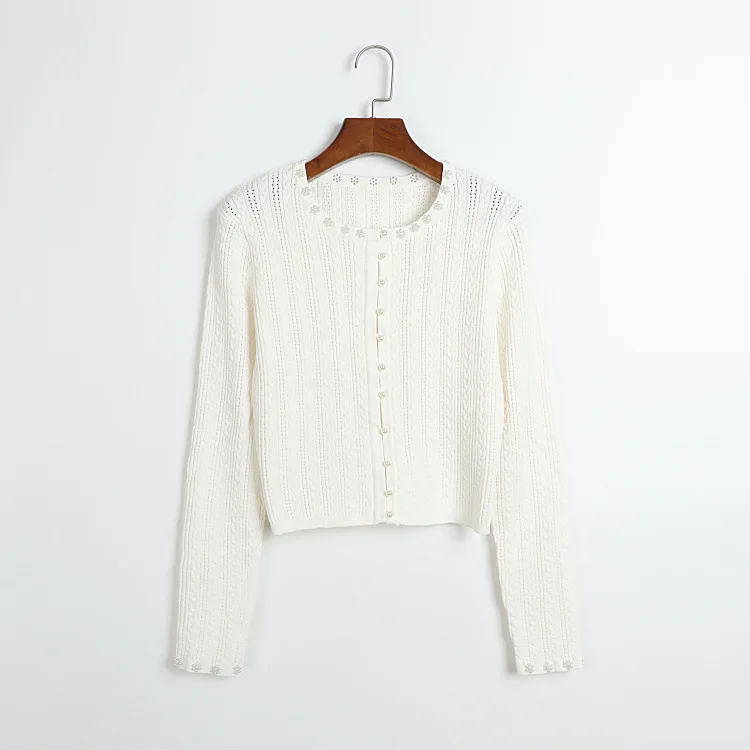 Dames gele kabelgebreide mouwloze maxi-jurk O-hals parelversiering wijde zoom Franse jurken zoete stijl casual gebreide jurk