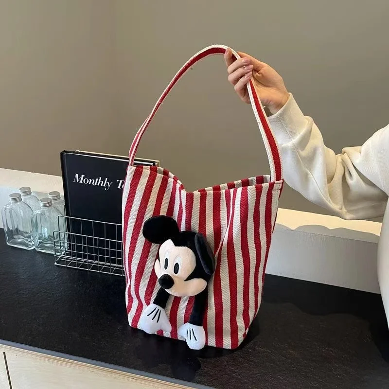 

Large capacity Mickey doll bag, single shoulder women's striped cloth bag, cartoon 2024 new lazy commuting bucket bag