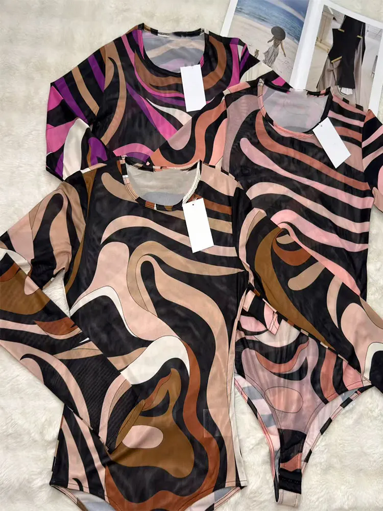 Retro Spring/Summer 2026 New sexy Vortex Printed Gauze Perspective Tight Elastic T-Shirt Jumpsuit Fashion Joker Holiday Blouse.