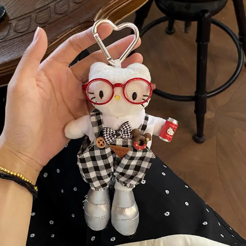 Sanrio salopette pour Hello Kitty porte-clés en peluche dessin animé lunettes créatives portant une poupée à longues jambes sac à dos fermeture éclair pendentif décoration