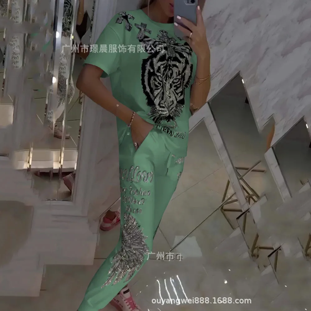 Amazon 2024 Summer New Fashion Casual Women's Cross-Border Foreign Trade Printed T-shirt Short-sleeved Pants Two-piece Set.