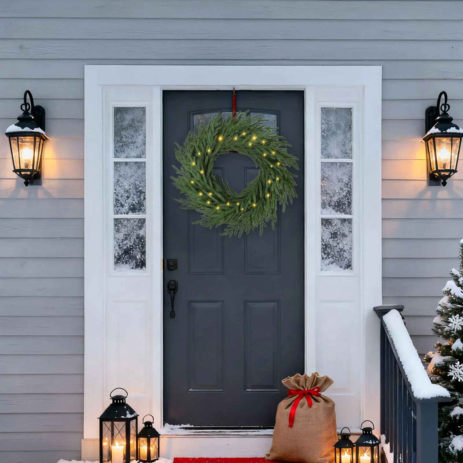 

Deck Your Door with a Glowing 24-Inch Norfolk Pine Wreath Adorned with 50 LEDs, Ribbons, and Bells for a Merry Welcome