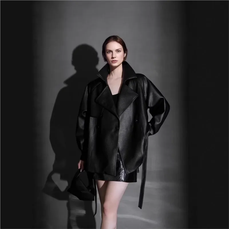 A new style of short with suit collar and cinched waist made leather is perfect for women