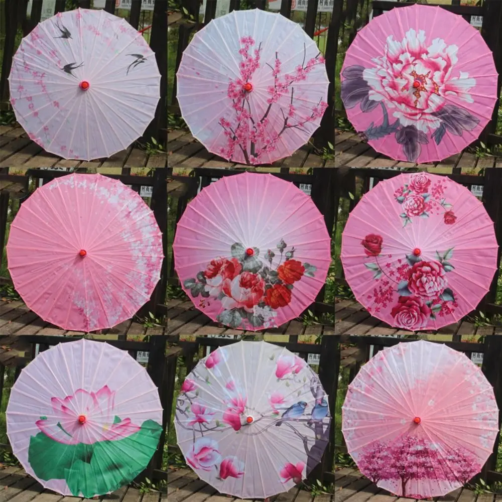 Ombrello cinese antico da sposa in carta oliata 56 cm Sfilata di moda classica Protezione solare Ombrello decorativo per bambini 10 colori