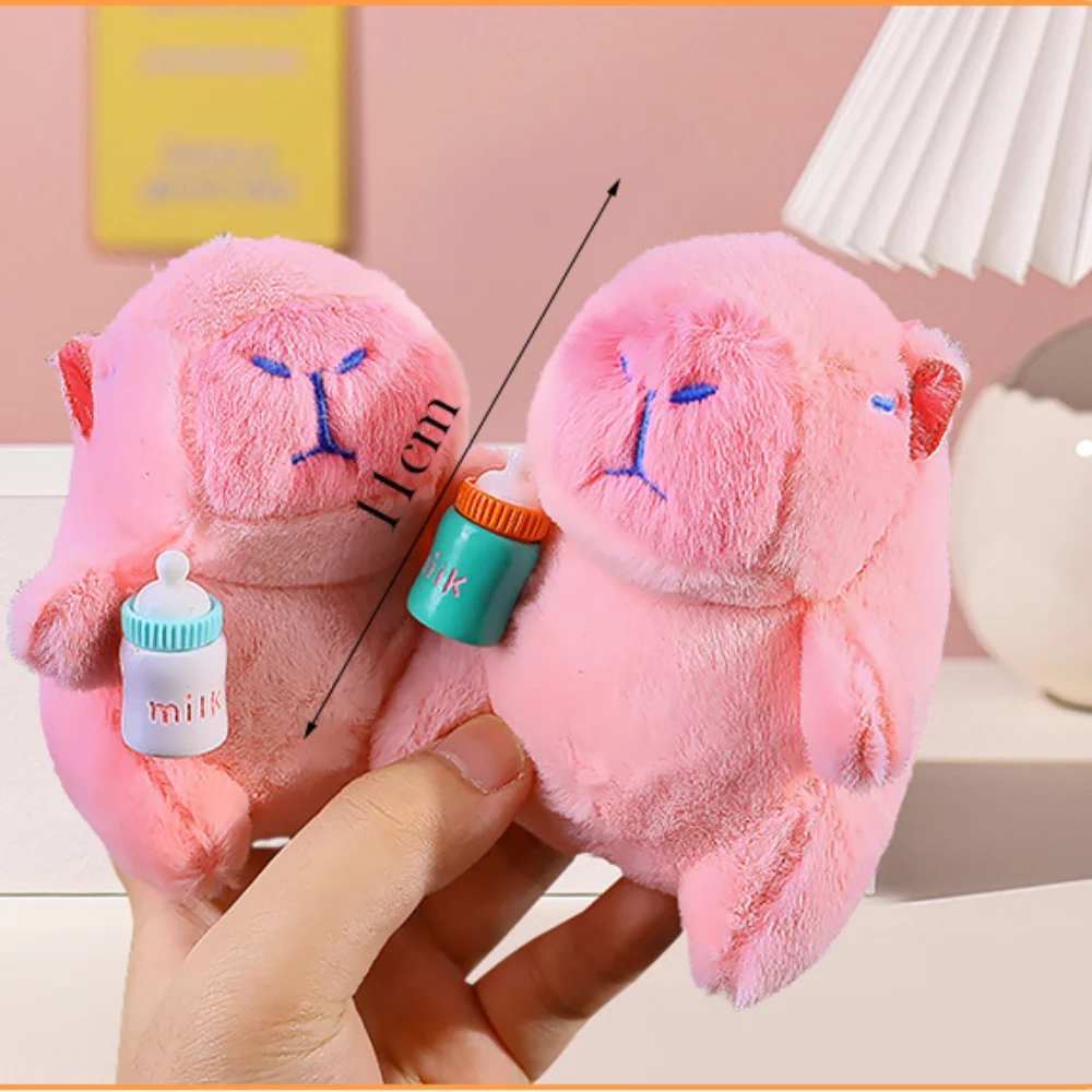 ขวดสีสุ่ม Capybara ตุ๊กตา Plush 11 ซม.ขวด Series พวงกุญแจกระเป๋าเป้สะพายหลังจี้ของเล่นแบบพกพาน่ารัก