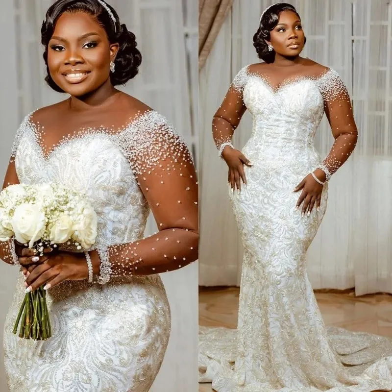 

Customized Plus Size African Wedding Dress Bridal Gowns For Bride Sheer Long Sleeves Appliqued Lace Beaded Pearls Illusion