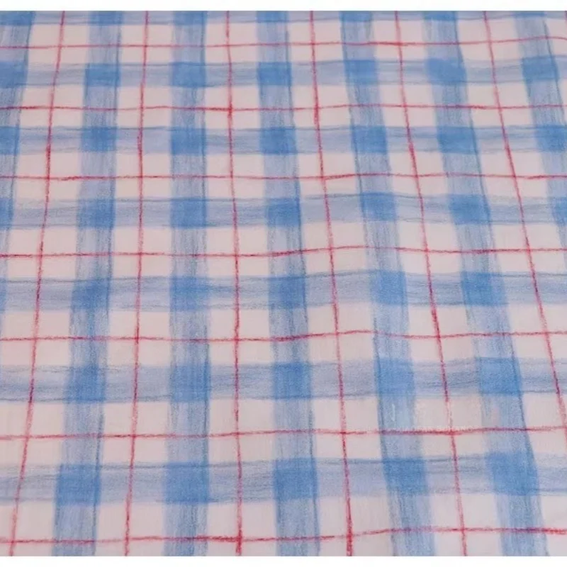 

50x145cm Blue crayon-drawn checkered cotton printed fabric is suitable for DIY fabric for shirts, dresses and skirts.