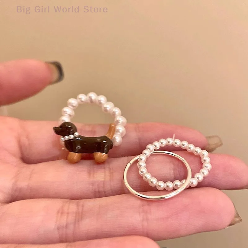 Innovative 2Pcs Cartoon Sausage Dog Ring with Simple Pearl Accent; Ideal for Women or Girls who Love Unique Fashion Accessories