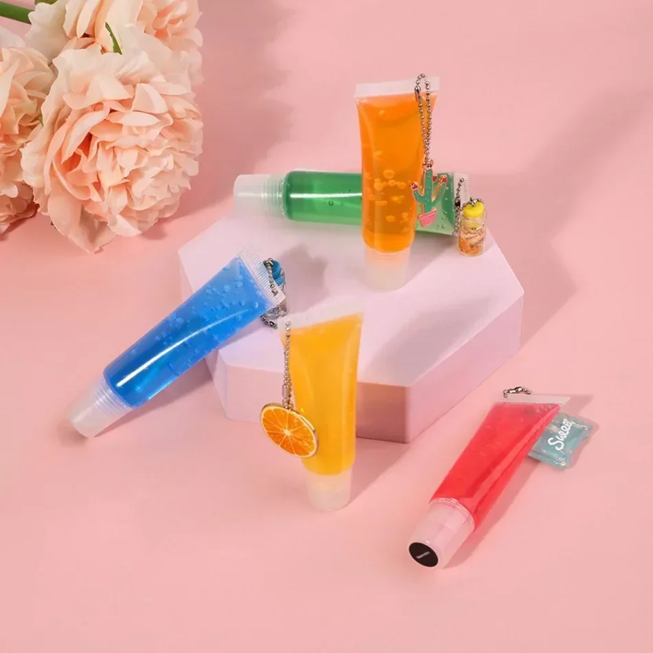 

Private Label Lip Gloss Pigment Keychain Fruity Rainbow Moisturizing Makeup Custom Logo Wholesale Cruelty Free Transparent Tube