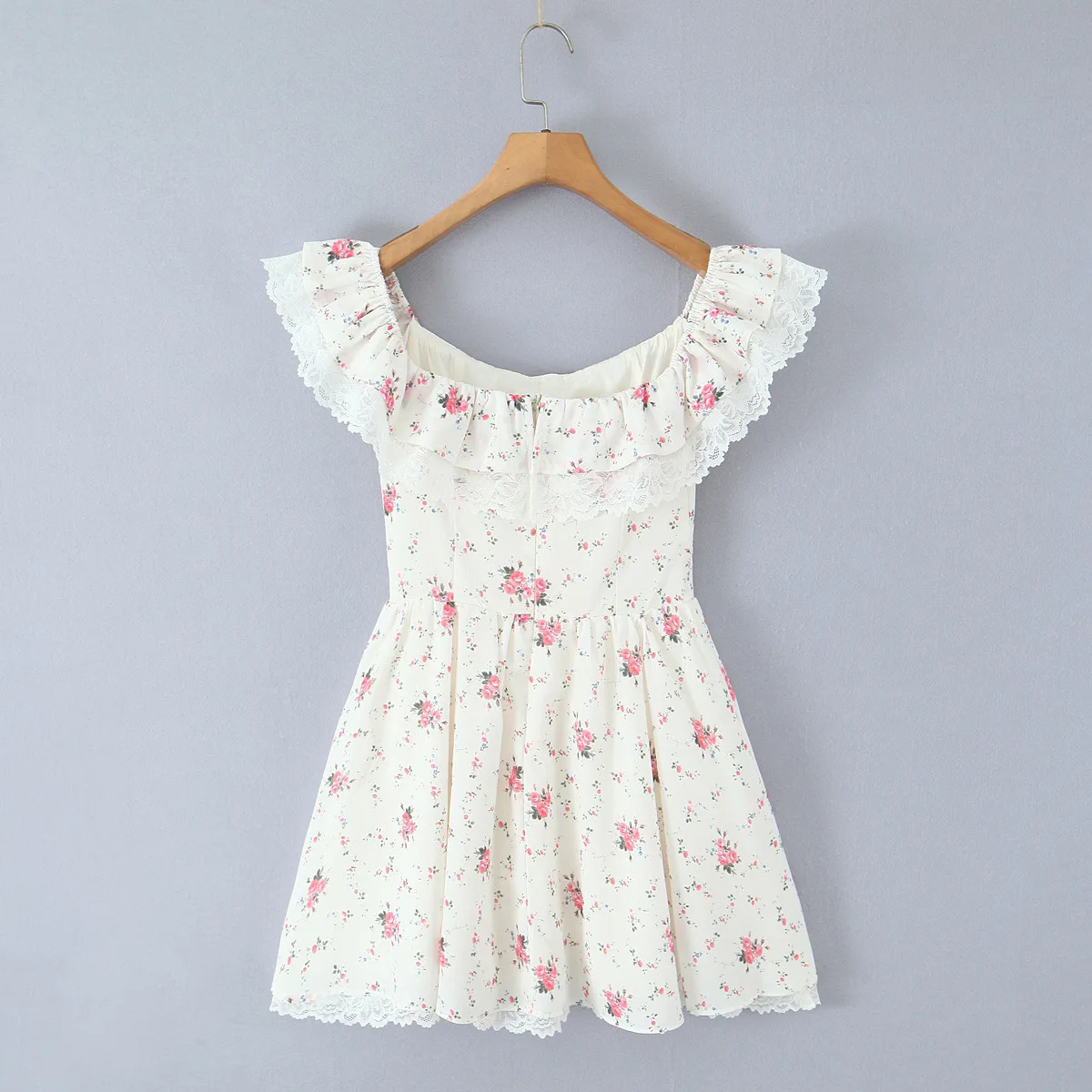 2025 Abiti estivi da donna con stampa floreale con fiocco sexy con spalle scoperte Manica corta Vita bassa Elegante mini abito da festa a trapezio