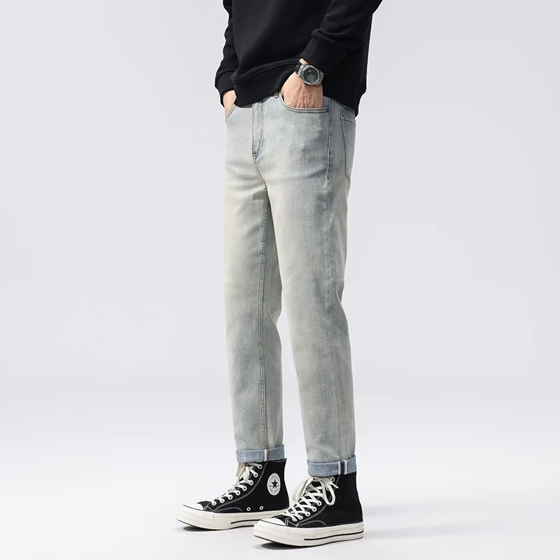 2025 ฤดูใบไม้ร่วงอเมริกันRetroซีเมนต์สีเหลืองDENIMกางเกงยีนส์ผู้ชายเกาหลีสไตล์อินเทรนด์ยืดเรียวตรงกางเกง