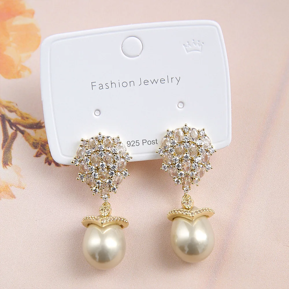 

Fashionable and exquisite micro-paved zircon stud earrings niche light luxury retro elegant temperament commuter earrings