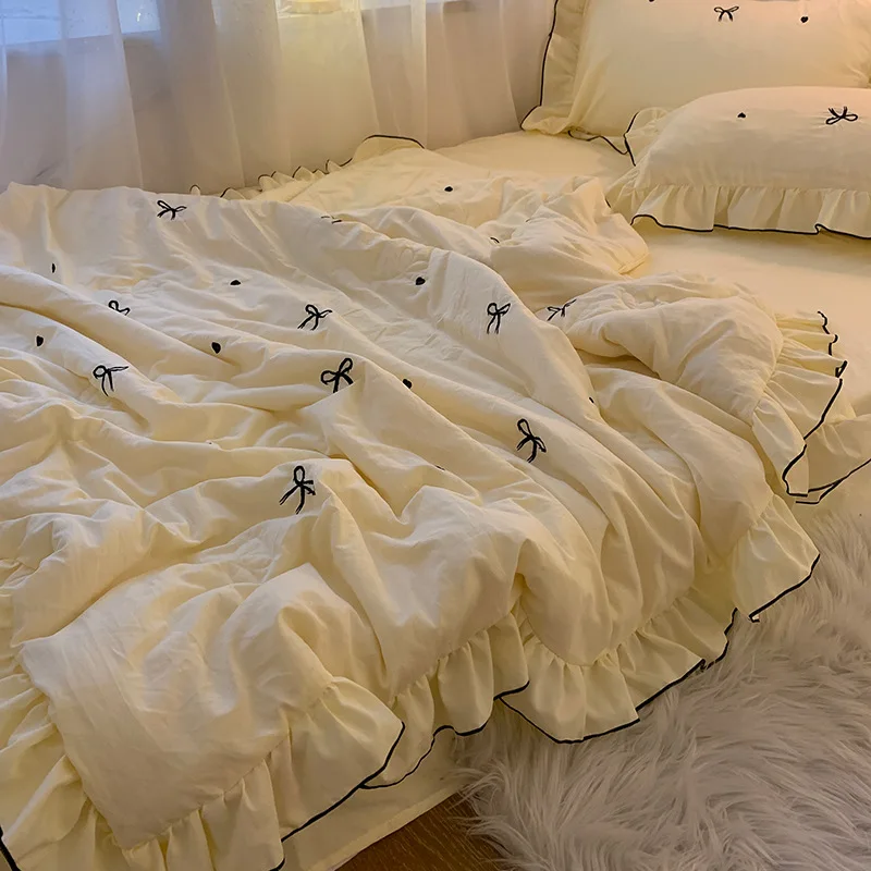

Yellow thin quilt Xia Liang quilt bow new air conditioner quilt four-piece cotton dormitory embroidery girl washed