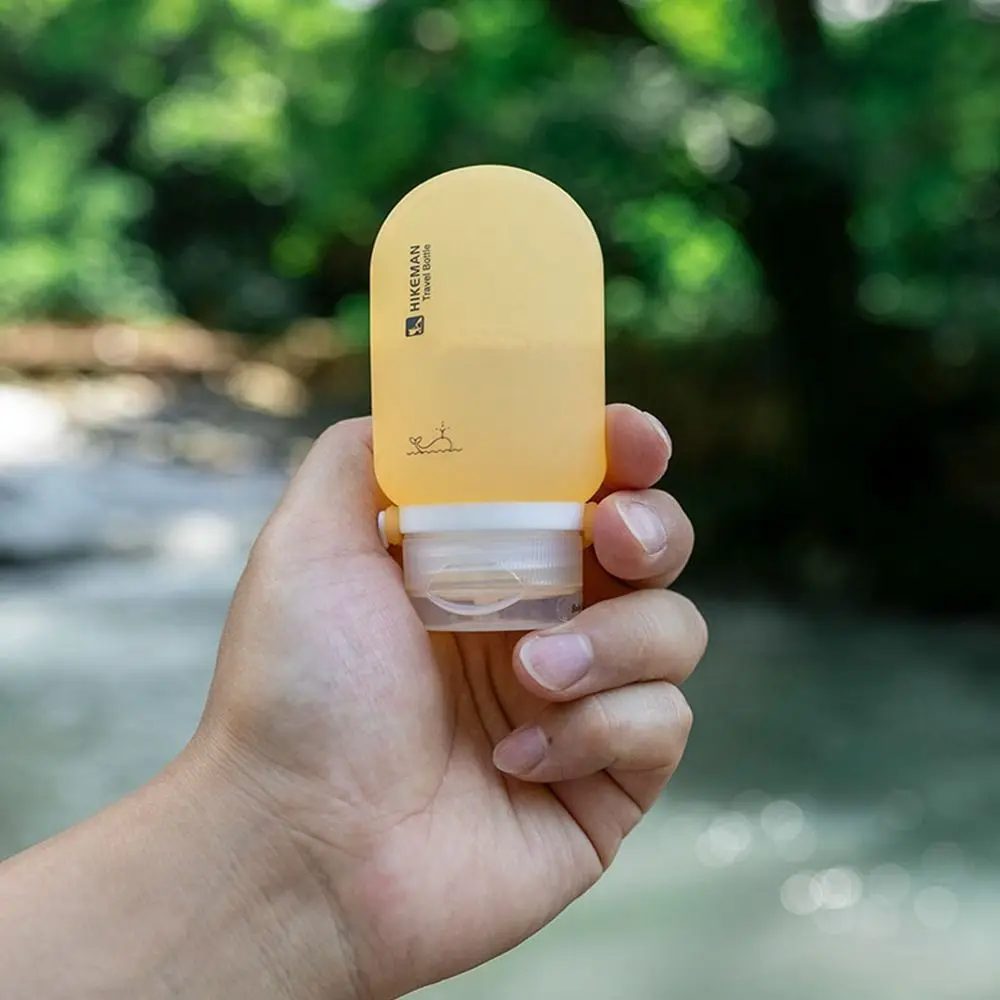 Novo portátil cosméticos viagem de acampamento garrafa dividida 60ml plástico viagem recarregável kit garrafa de silicone à prova de vazamento garrafa recarregável