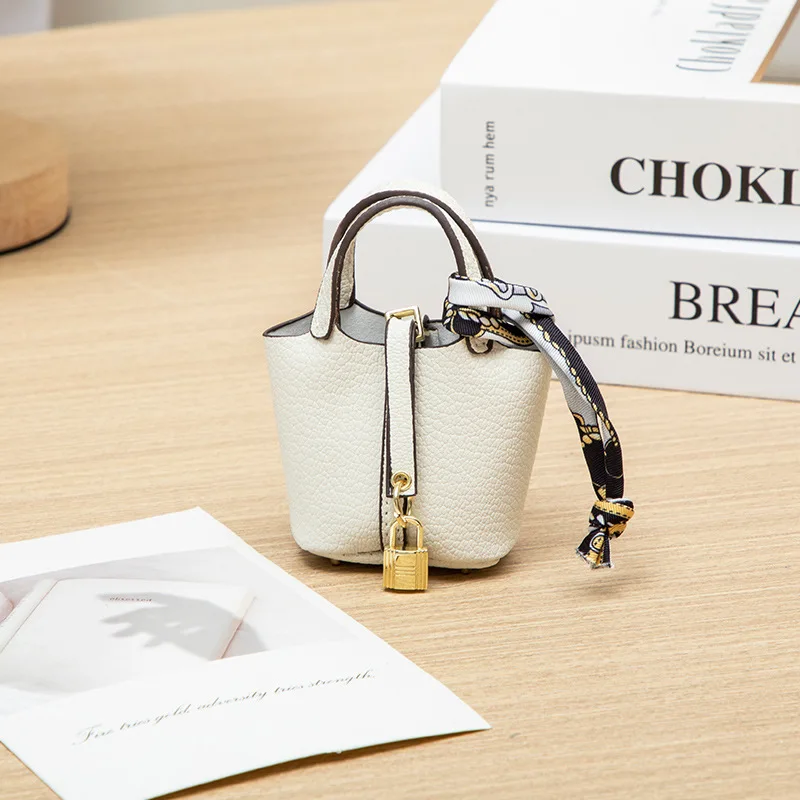 2026 Mini-Taschenanhänger Schlüsselanhänger Hängeaccessoire Zero Wallet Kreatives tragbares Armband Bluetooth-Kopfhörertasche Multifunktional – Detail 14