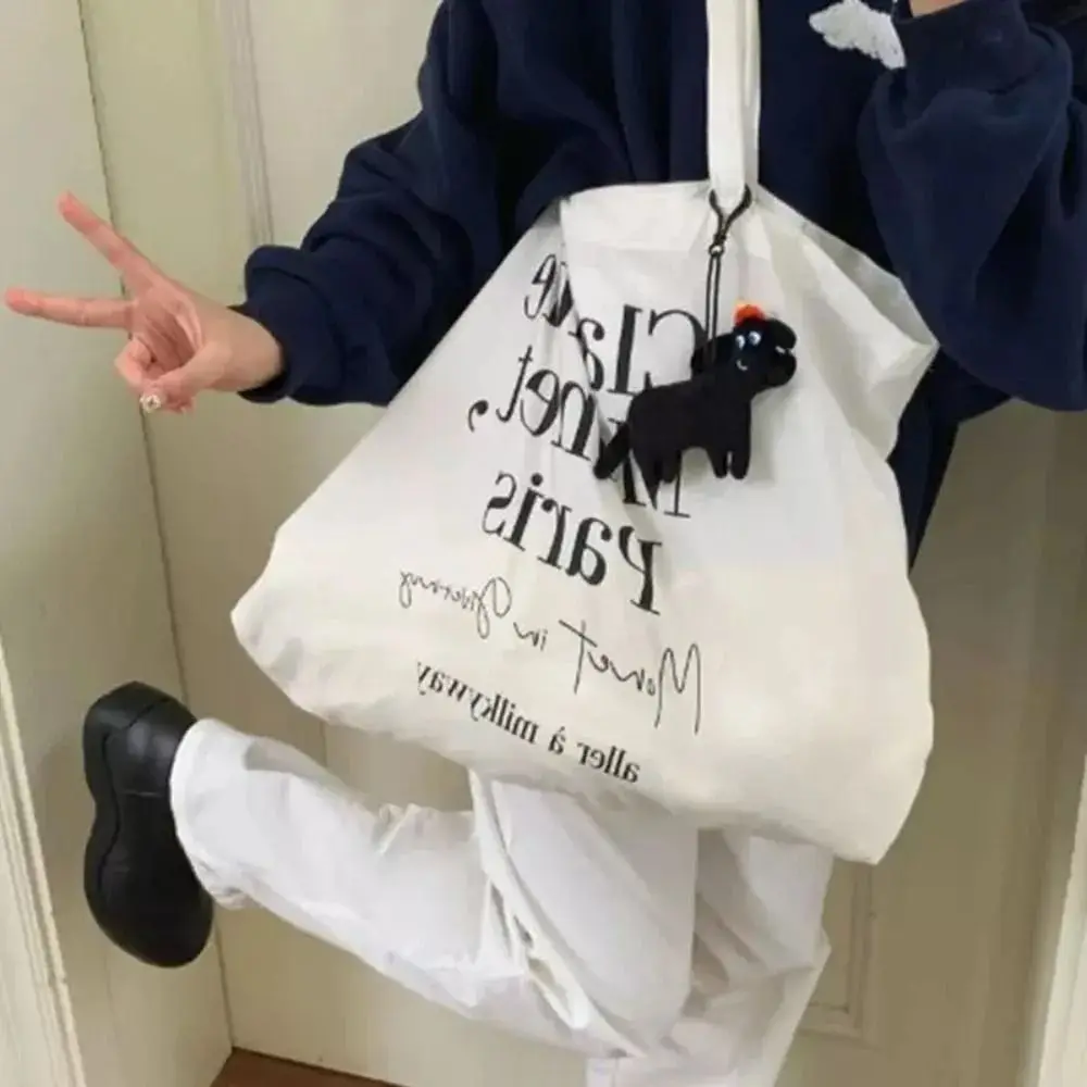 

Новый мягкий рождественский кулон в виде щенка, игрушечная сумка, украшение для рюкзака, подвески, забавный брелок с черной собакой