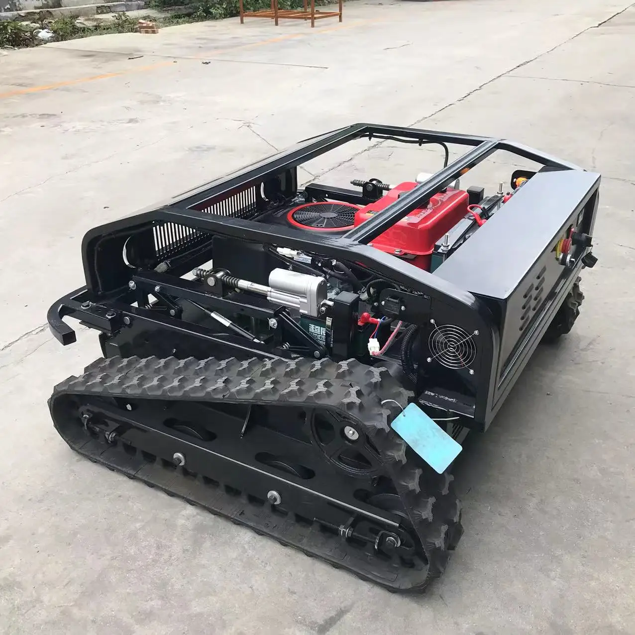 RC التحكم عن بعد حديقة الزاحف جزازة العشب جزازة العشب الصغيرة لجزازة الأراضي القاحلة الكهربائية على منحدر الطريق