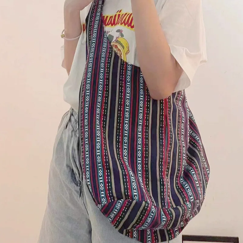 KK  2024 New Large Capacity Canvas Aztec One Shoulder Handheld Cotton and Hemp Canvas Jacquard Casual Women's top handle bags