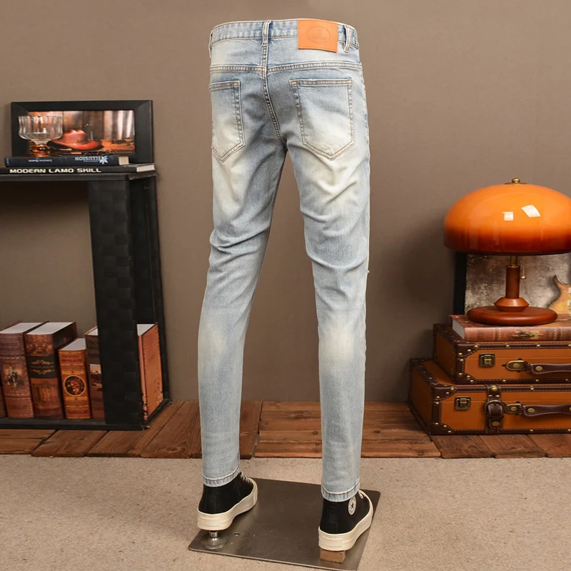 Fashionable new men's jeans with scratches, washed water, nostalgic stretch, slim fit, retro light blue jeans, designer embroide