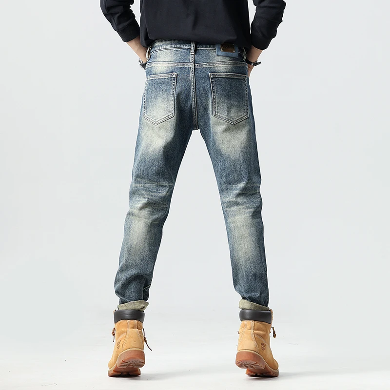 Fashionable patchwork irregular patchwork design jeans for men's slim fit small straight leg elastic American trendy pants