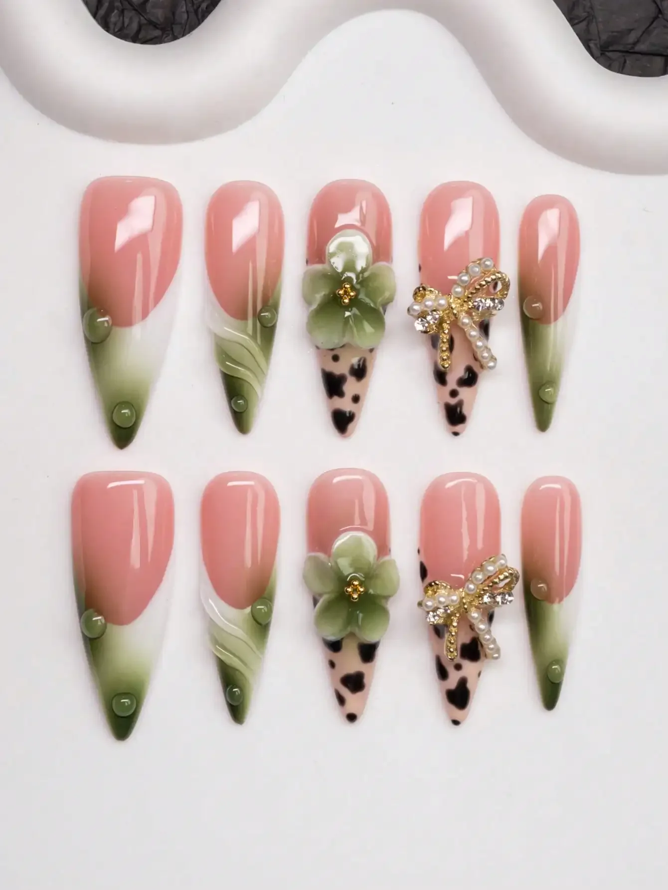 

Handmade Almond-Shaped Press-On Nails With Y2K Baddie Style, Featuring Nude, Green, And White Nail Plates With Cream Tip, Tie Dy