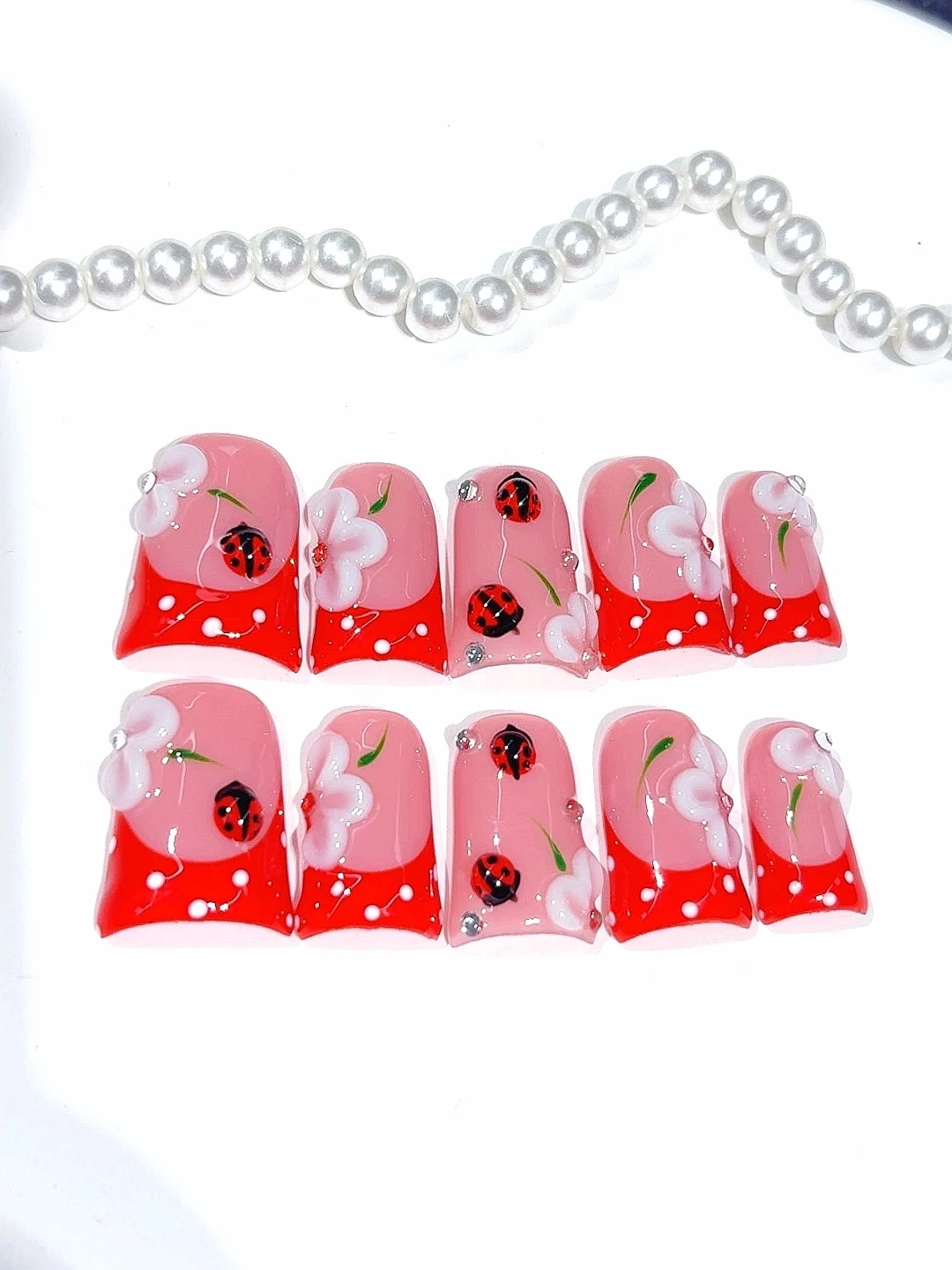 Coccinelle rose et rouge fleur 3D bec de canard presse sur les ongles, ensemble de faux ongles faits à la main pour les femmes (10 pièces) L289